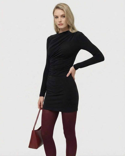 Noiré Mini Dress by SLIMONA featuring long sleeves, high waist, and elegant applique detail.