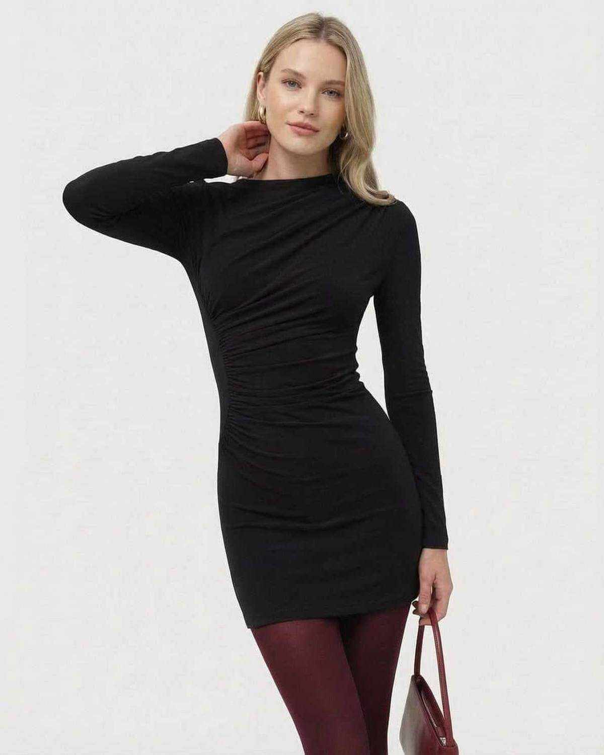Noiré Mini Dress from SLIMONA, featuring long sleeves and a bodycon fit, perfect for a chic modern look.