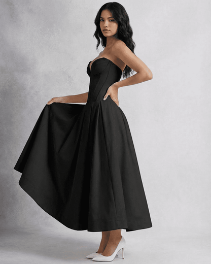 Nova Midi Dress by SLIMONA, a sleek strapless A-line dress with a flowing skirt and flattering silhouette.