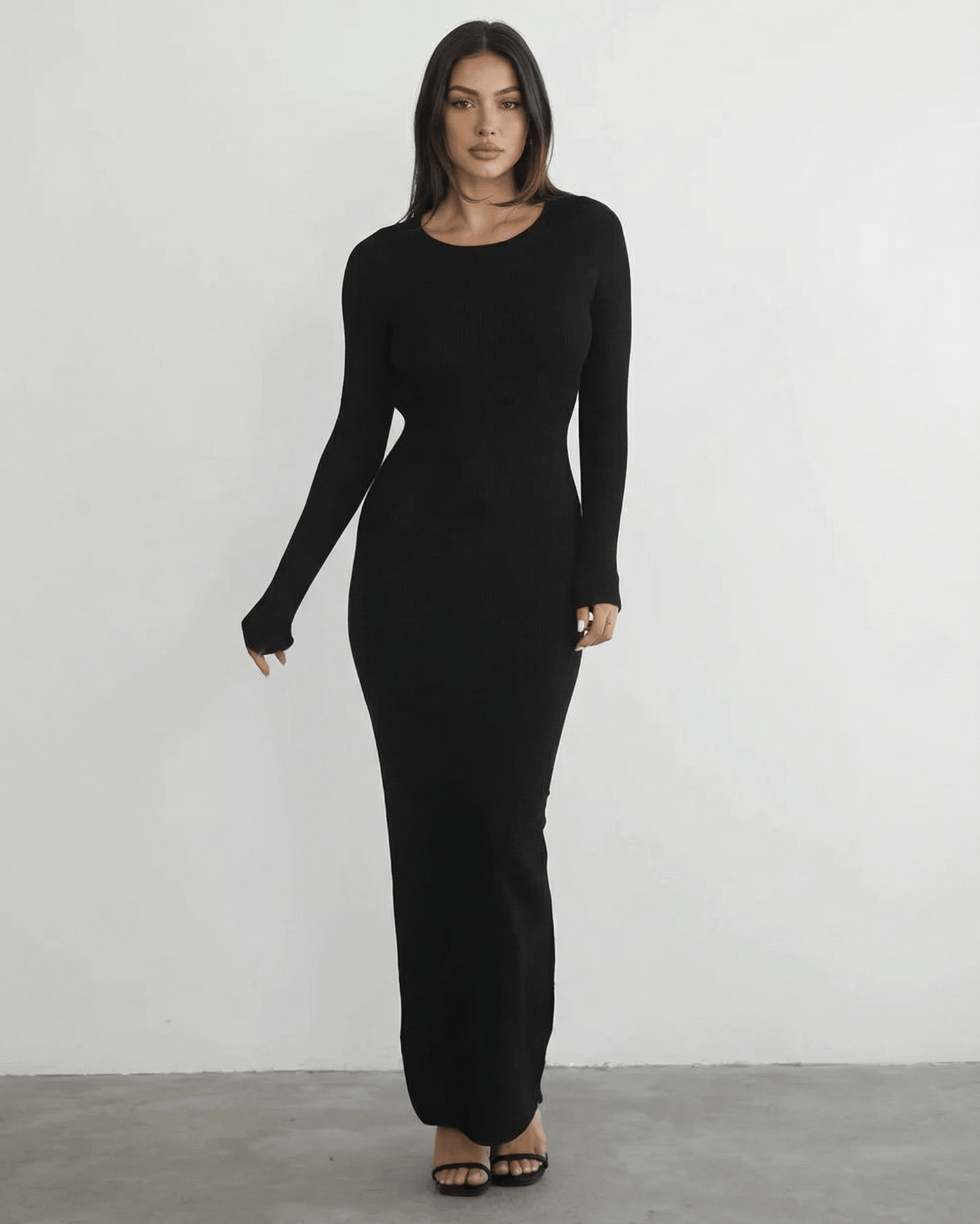 Nyx Maxi Dress by Lauven featuring a long sleeve black design and sleek pencil silhouette.