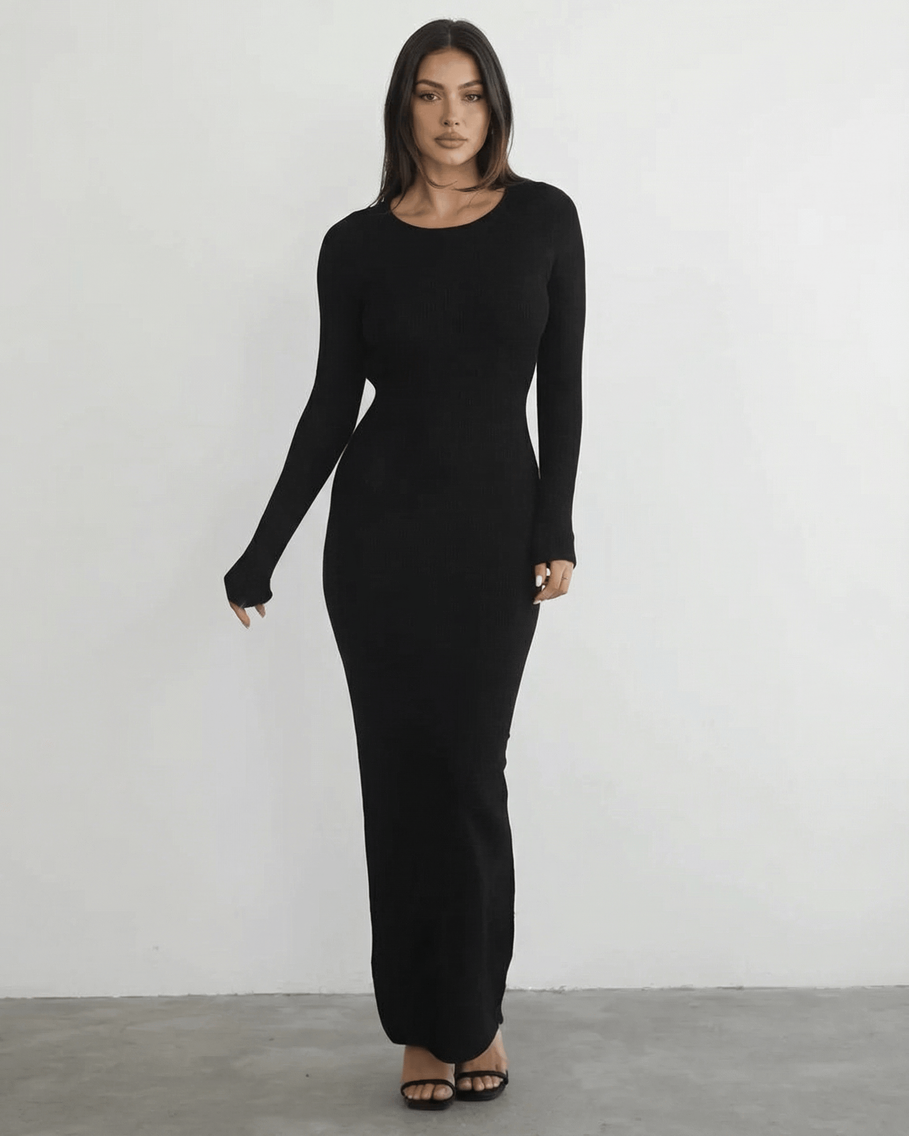 Nyx Maxi Dress by Lauven featuring a long sleeve black design and sleek pencil silhouette.