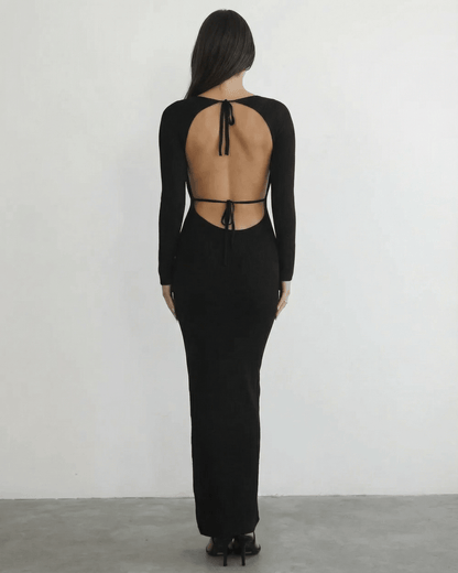 Nyx Maxi Dress from Lauven, showcasing the elegant back detail and long sleeve design.