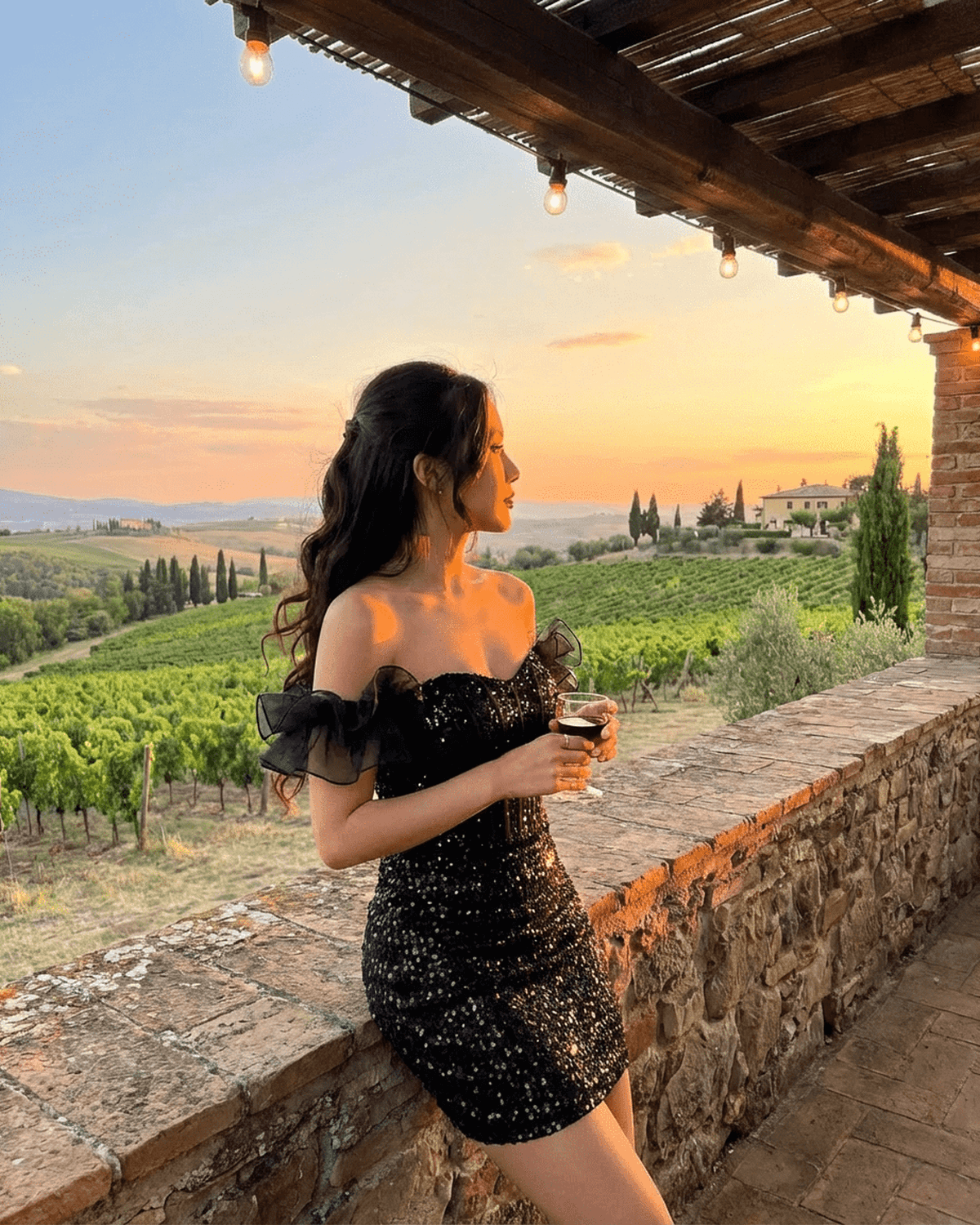 Obsidian Mini Dress by SLIMONA - Black Sequin Off-The-Shoulder Dress with Ruffle Sleeves in a Scenic Vineyard Setting