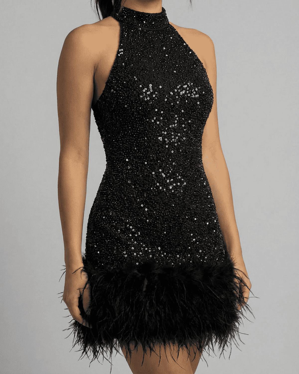 Onyx Mini Dress by SLIMONA - Black sequin halter bodycon with fuzzy hem, perfect for a glamorous night out.