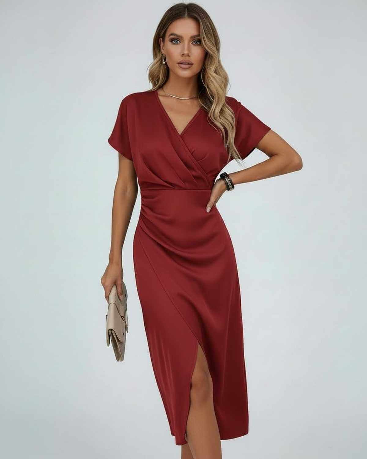 Orion Midi Dress by Lauven, a luxurious deep red wrap dress with a flattering silhouette and subtle front slit.