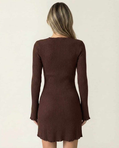 Back view of the Orion Mini Dress by Lauven, showcasing its ribbed fabric and flare sleeves in deep chocolate brown.