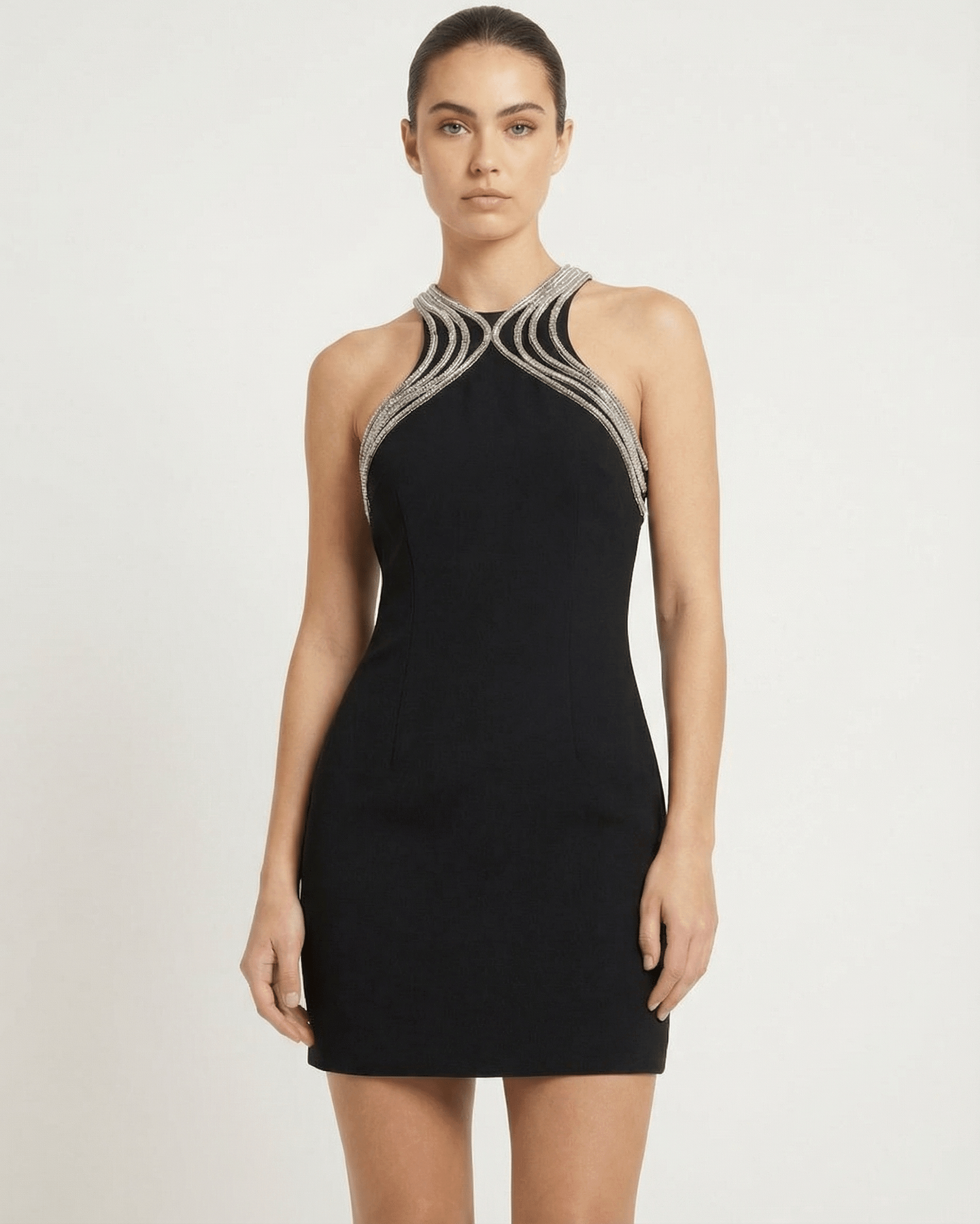 Orion Mini Dress by Lauven, sleeveless sheath mini dress with embellished O-neck and metallic trim.