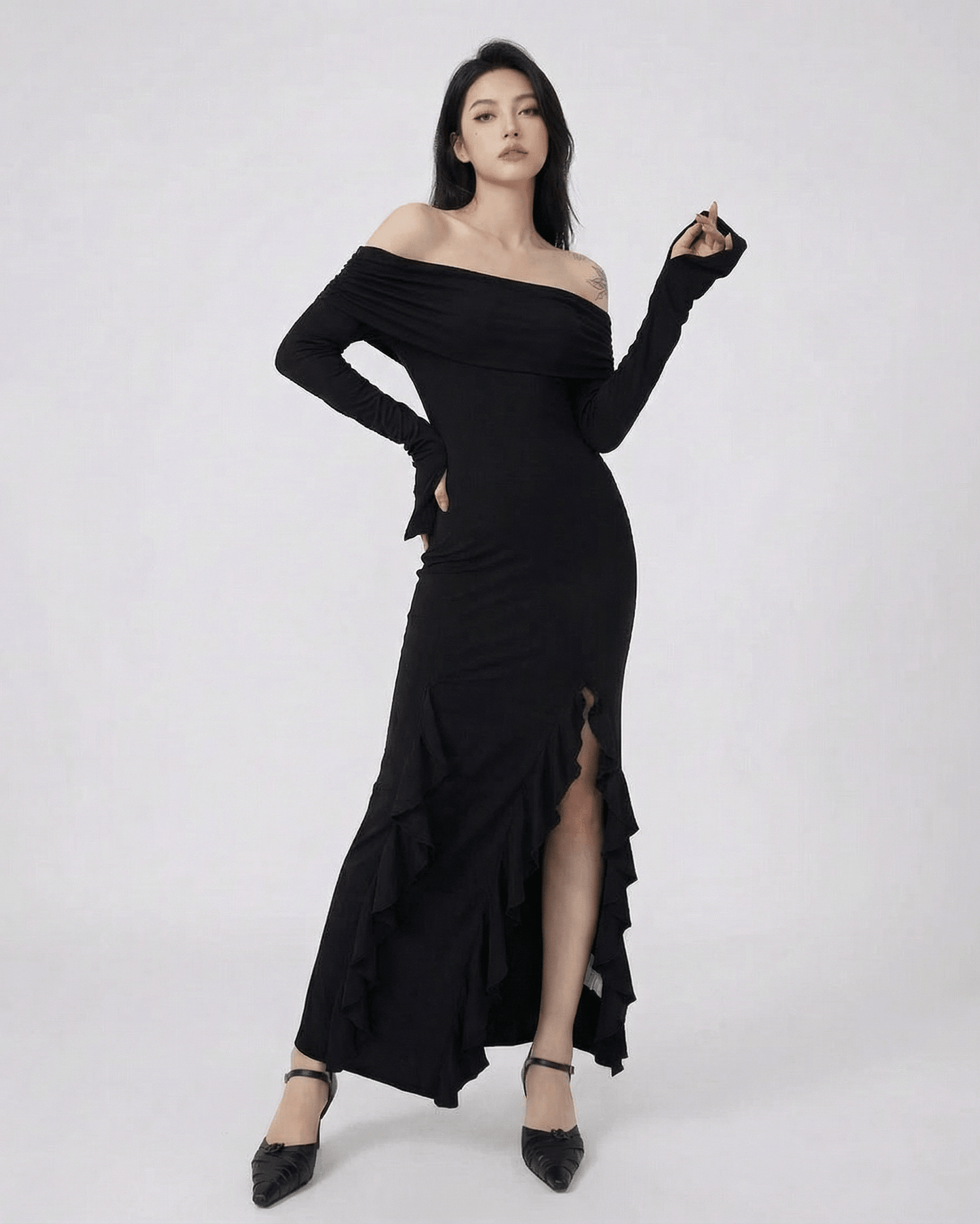 Raven Maxi Dress by Lauven - Off-Shoulder Asymmetrical Ruffle Dress with Flare Sleeves in black.