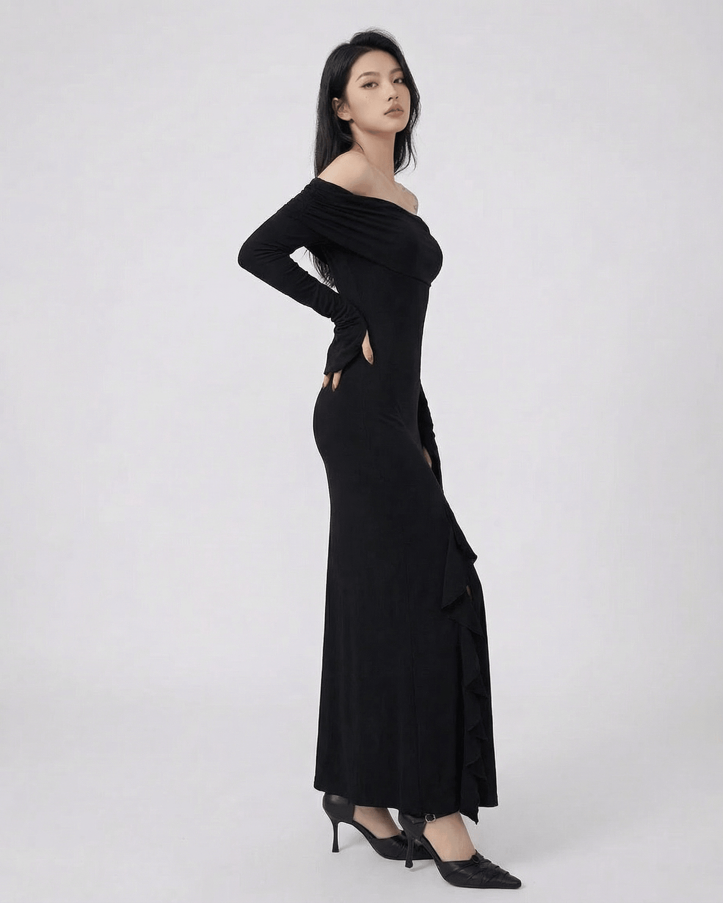 Raven Maxi Dress by Lauven - Off-shoulder asymmetrical ruffle dress with flare sleeves in black.