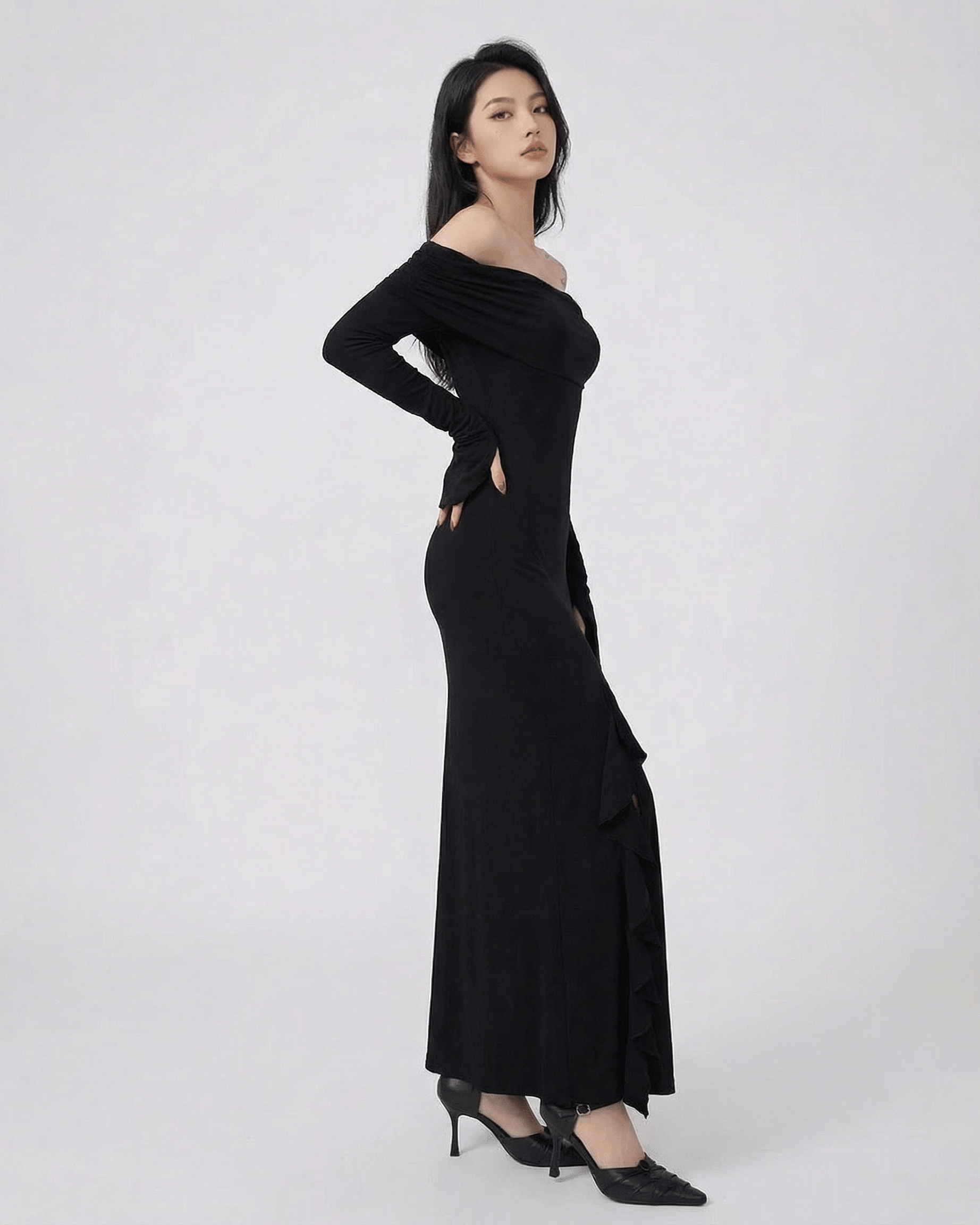 Raven Maxi Dress by Lauven - Off-shoulder asymmetrical ruffle dress with flare sleeves in black.