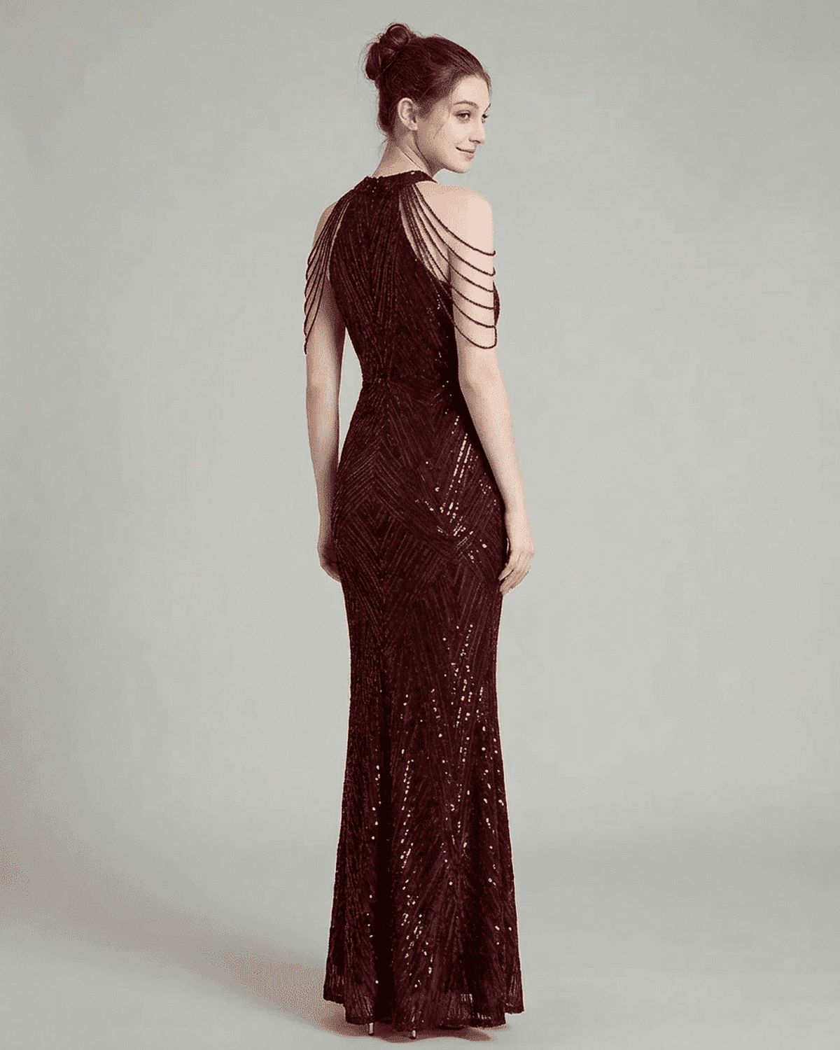 Ruby Maxi Dress by SLIMONA, showcasing elegant halter neckline and alluring sequin details.
