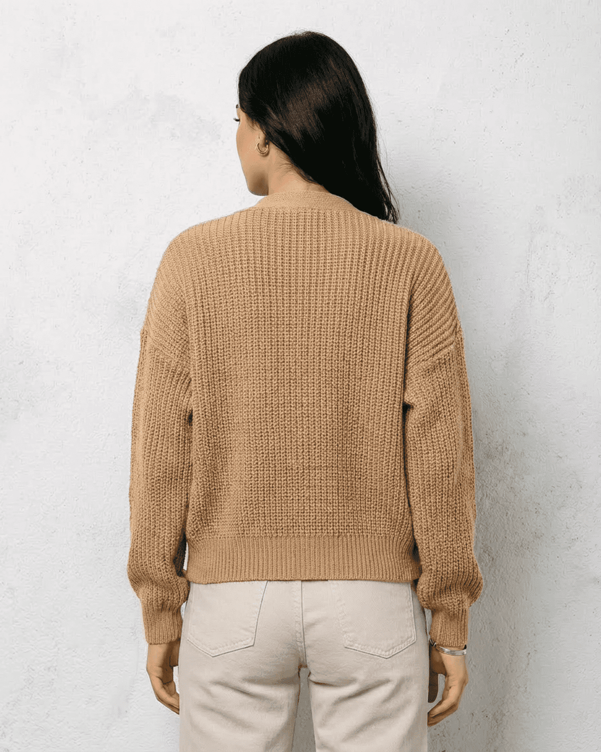 Saffron Cardigan from SLIMONA, featuring a relaxed fit and cozy knit texture, perfect for layering.