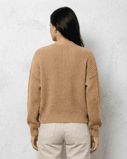Saffron Cardigan from SLIMONA, featuring a relaxed fit and cozy knit texture, perfect for layering.