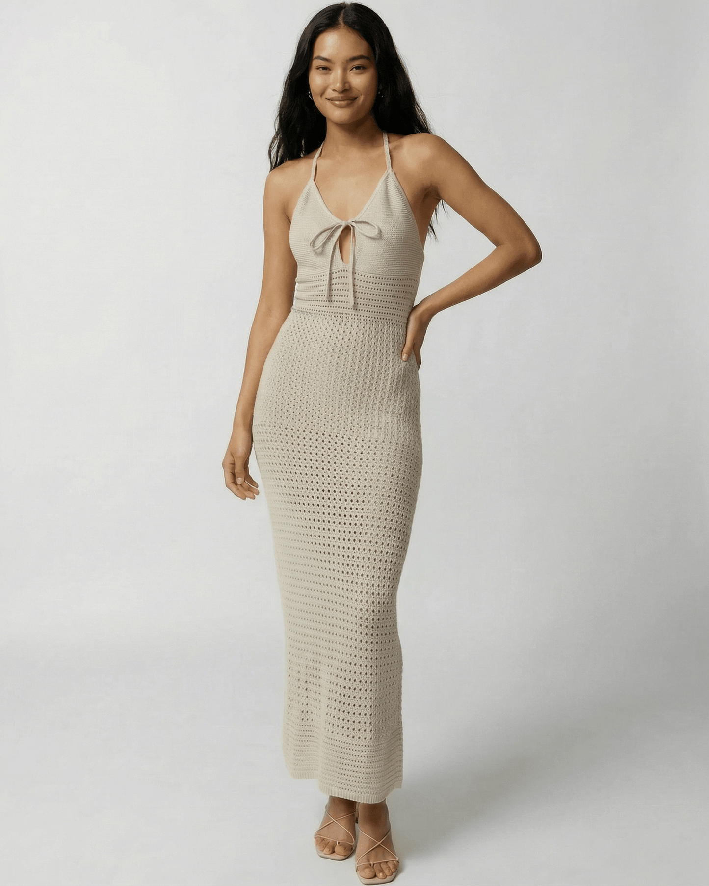 Sahara Maxi Dress by Lauven, crochet halter neck design featuring open-knit detail and ankle-length fit.