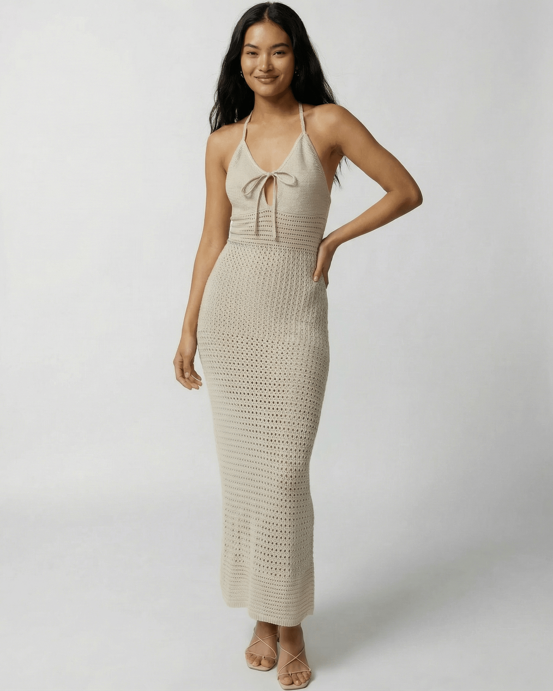 Sahara Maxi Dress by Lauven, crochet halter neck design featuring open-knit detail and ankle-length fit.