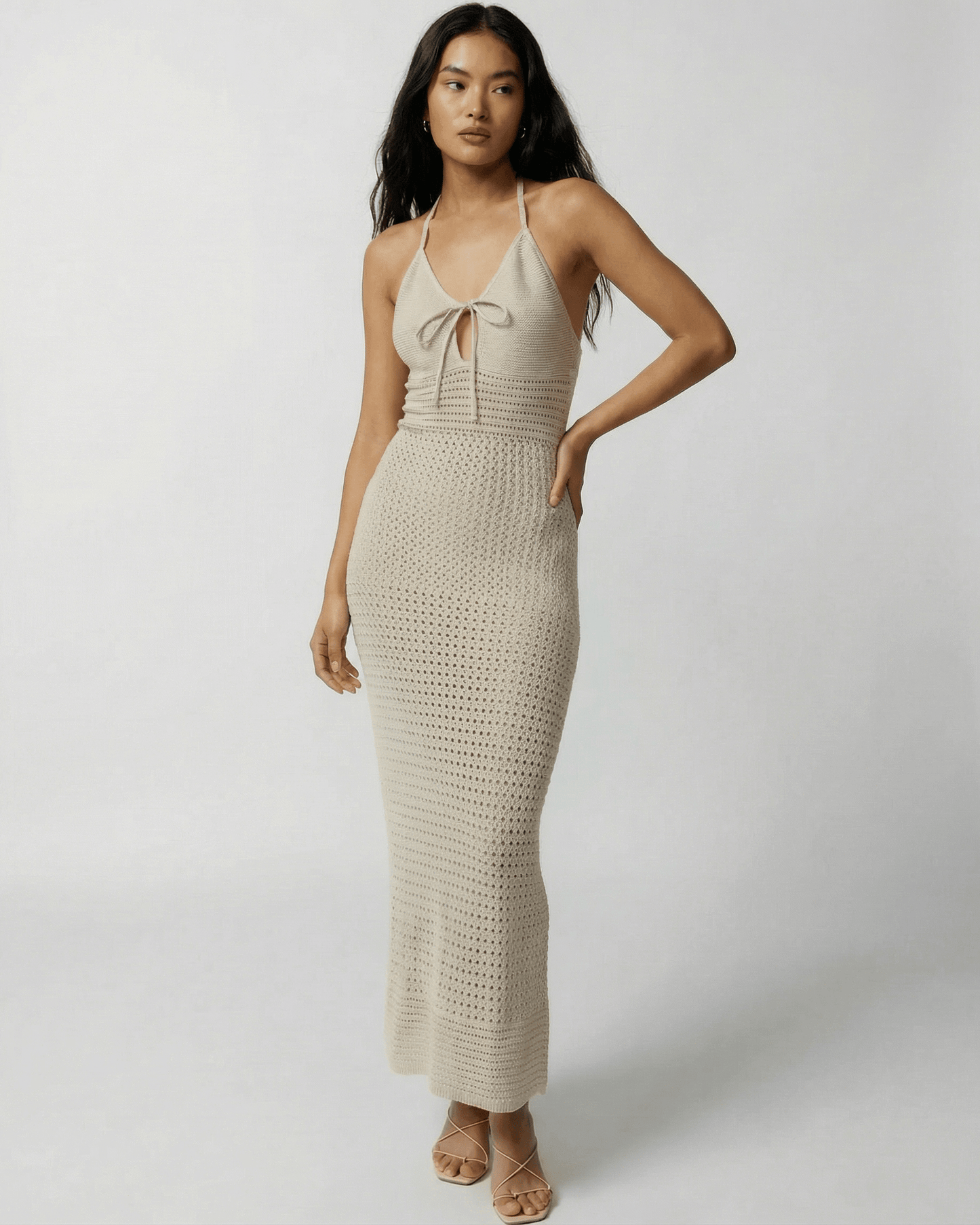 Sahara Maxi Dress by Lauven, featuring a crochet halter neck and relaxed silhouette, perfect for warm weather.