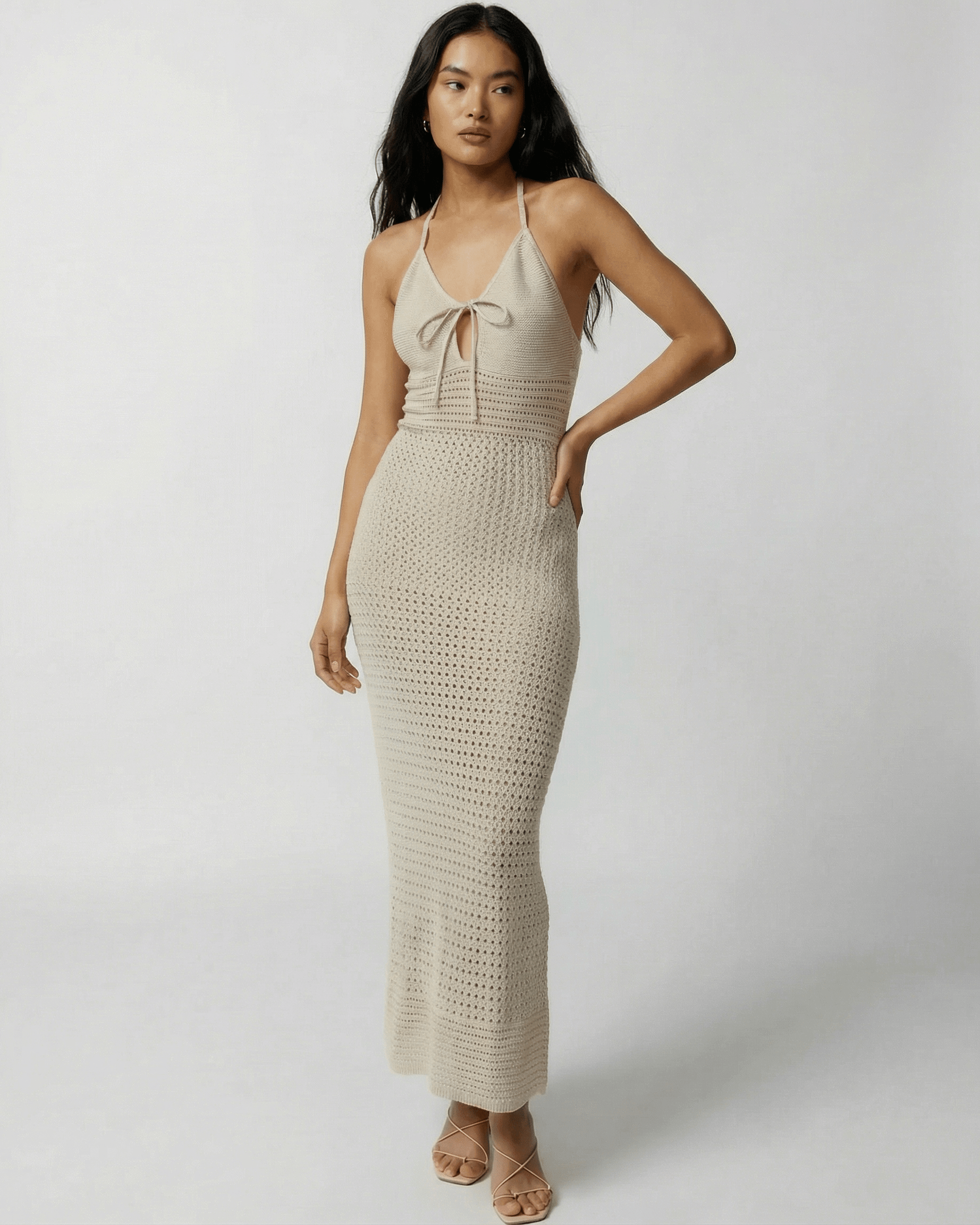 Sahara Maxi Dress by Lauven, featuring a crochet halter neck and relaxed silhouette, perfect for warm weather.