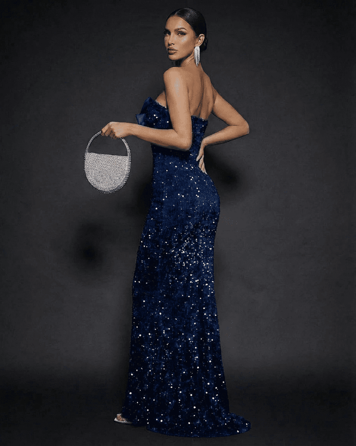 Sapphire Maxi Dress from SLIMONA, featuring a strapless design and dazzling sequins for a glamorous evening look.