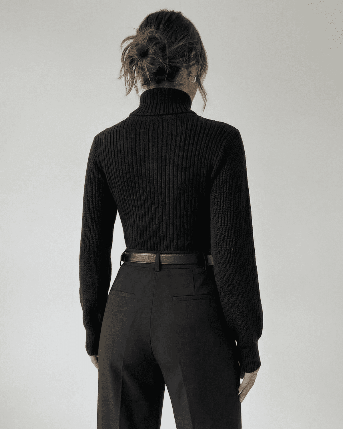 Back view of Sarina Sweater by SLIMONA, featuring a chic mock neck and slim fit design in black.