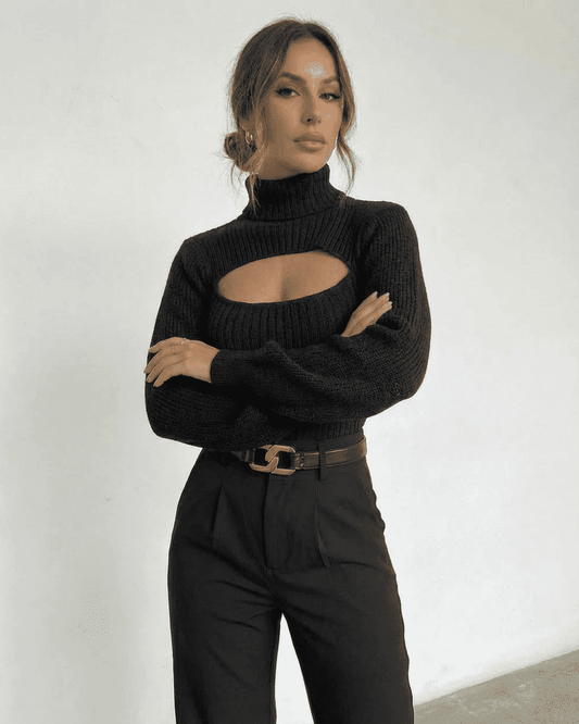 Sarina Sweater by SLIMONA - Chic hollow out mock neck black slim fit sweater worn with stylish high-waisted pants.