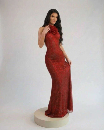 Scarlet Maxi Dress by SLIMONA on model showcasing halter neck and floral detail in rich red tone.