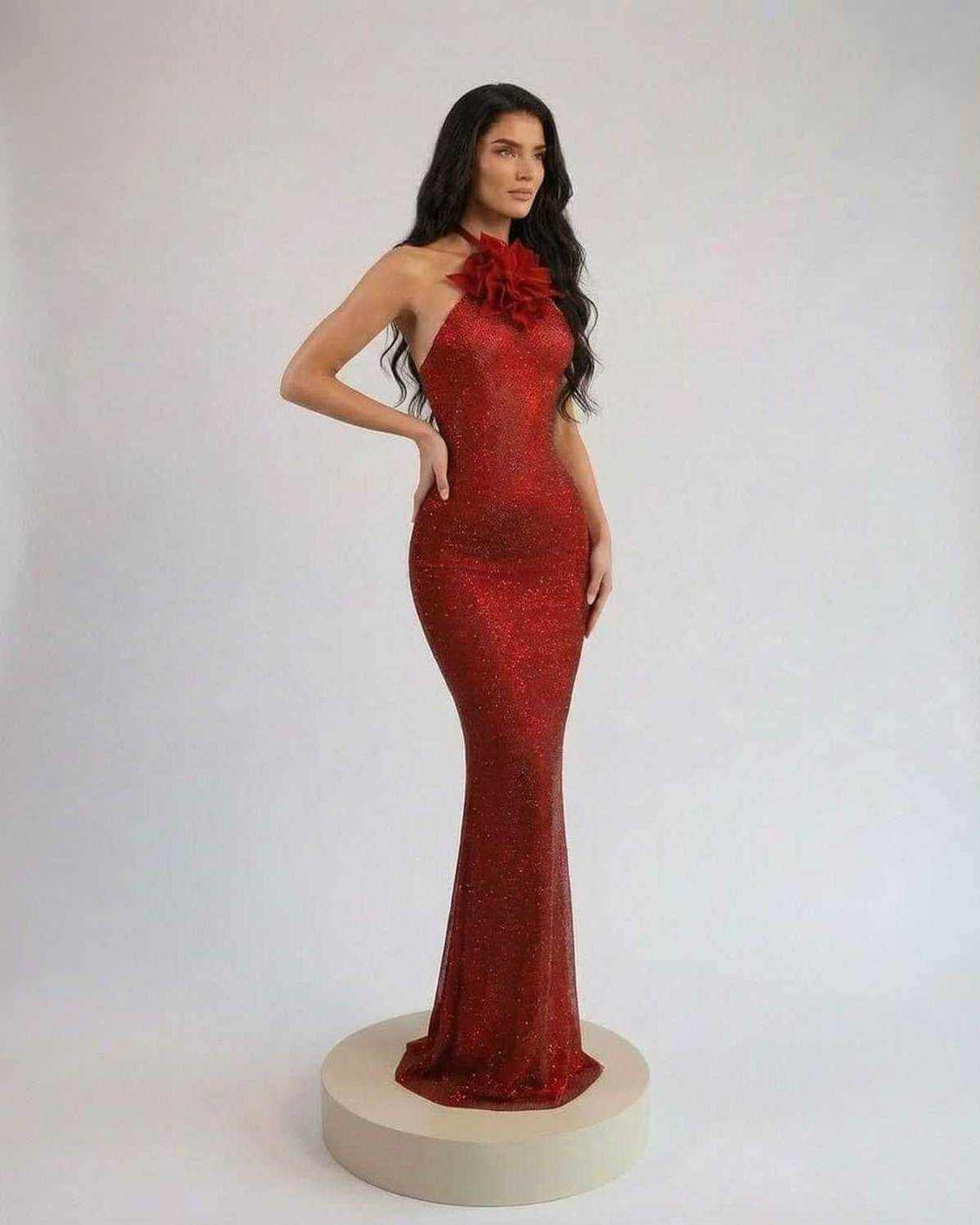 Scarlet Maxi Dress by SLIMONA featuring a halter neck and floral detail in a stunning red tone.