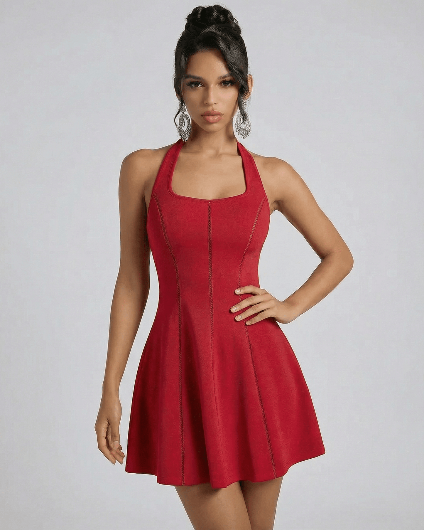 Scarlet Mini Dress by SLIMONA showcasing a red flared silhouette with a U-neckline and sleeveless design.