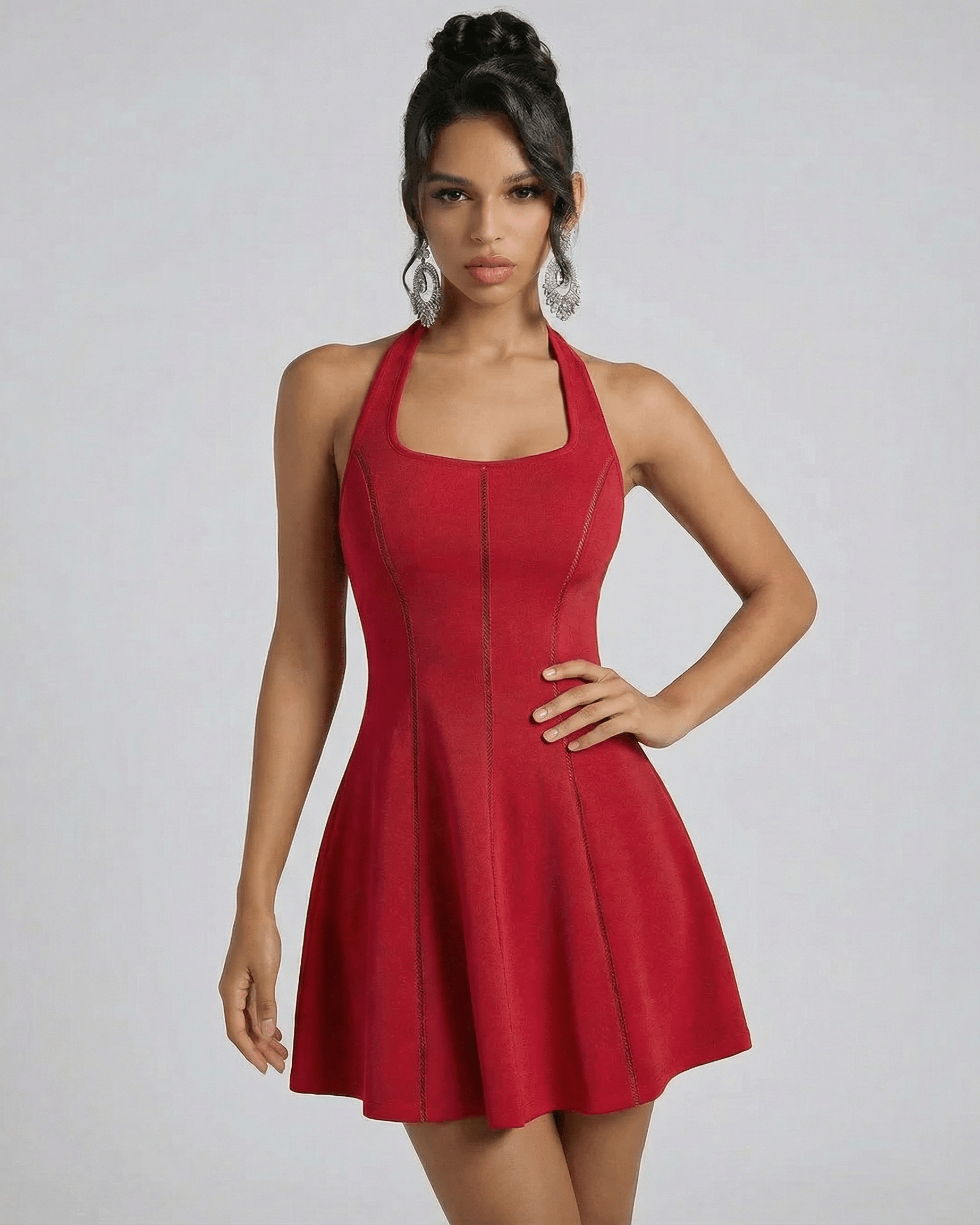 Scarlet Mini Dress by SLIMONA showcasing a red flared silhouette with a U-neckline and sleeveless design.