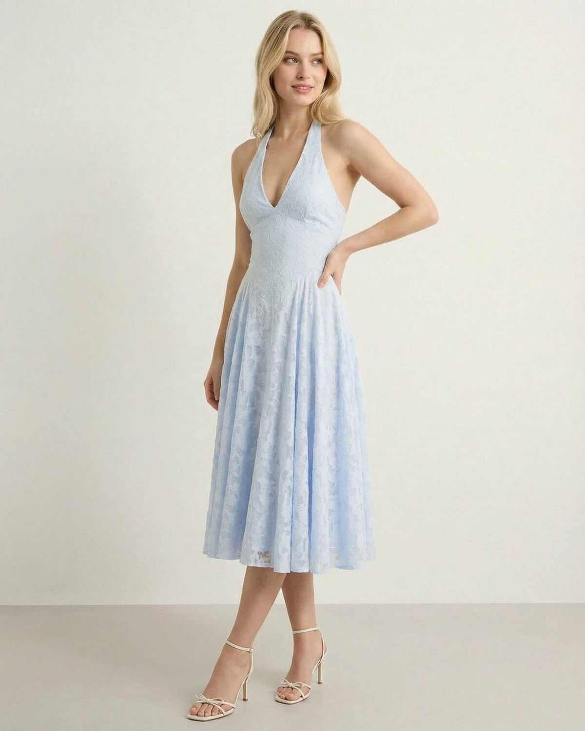Selene Midi Dress by SLIMONA in soft blue jacquard with elegant A-line silhouette and halter neck design.