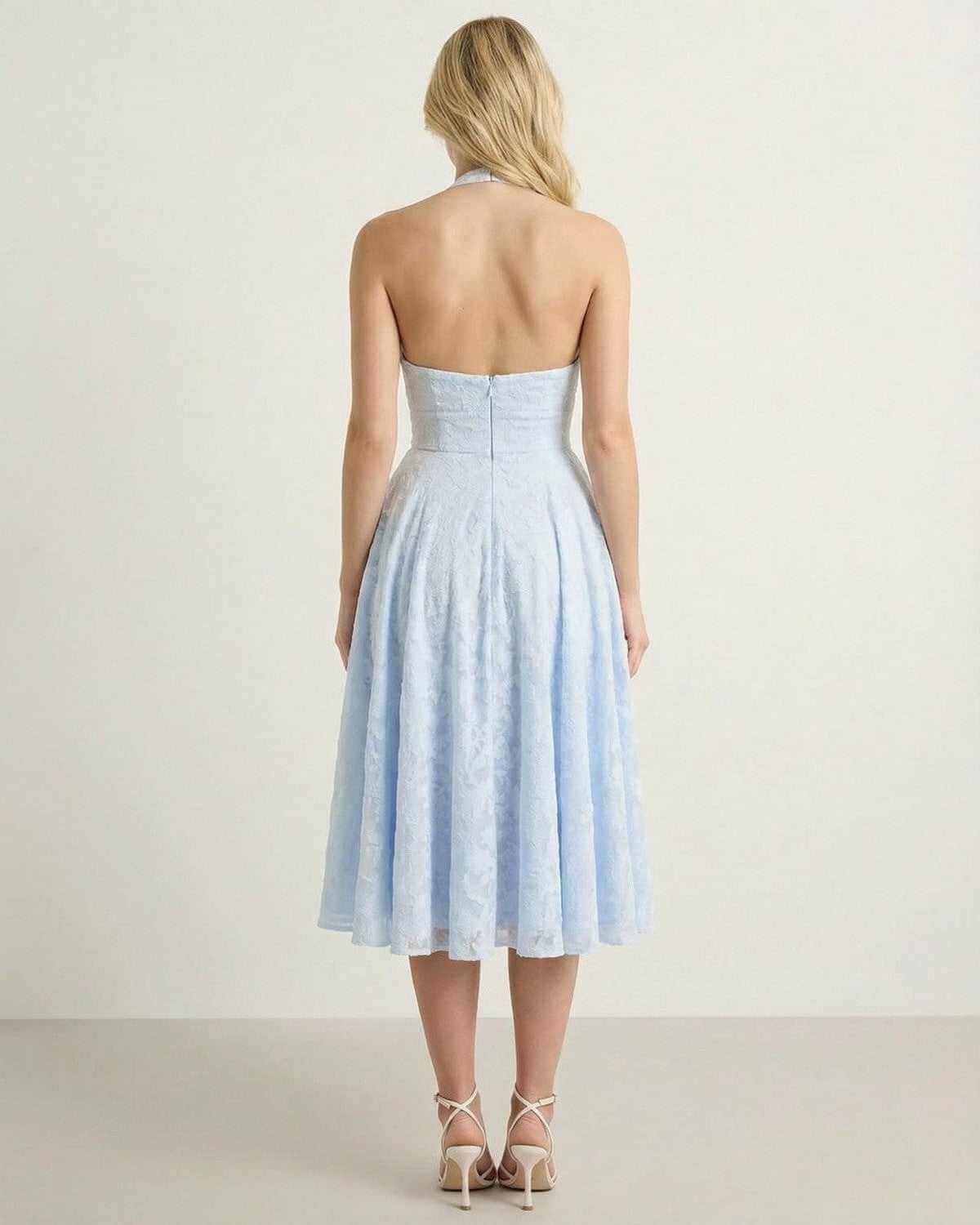 Back view of the Selene Midi Dress by SLIMONA, showcasing its elegant A-line silhouette and soft jacquard texture.