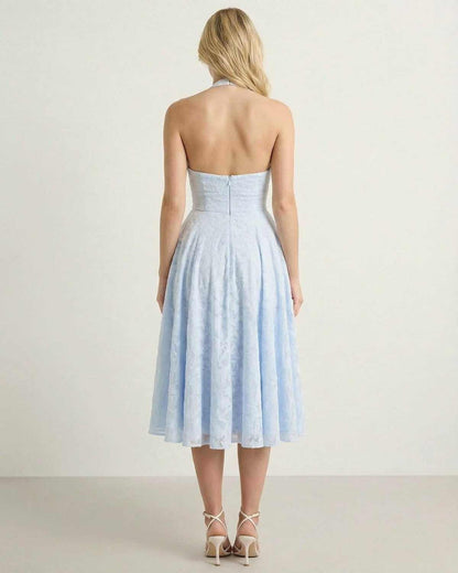 Back view of the Selene Midi Dress by SLIMONA, showcasing its elegant A-line silhouette and soft jacquard texture.