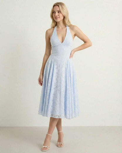 Elegant Selene Midi Dress in soft blue jacquard, showcasing a flattering A-line silhouette by SLIMONA.