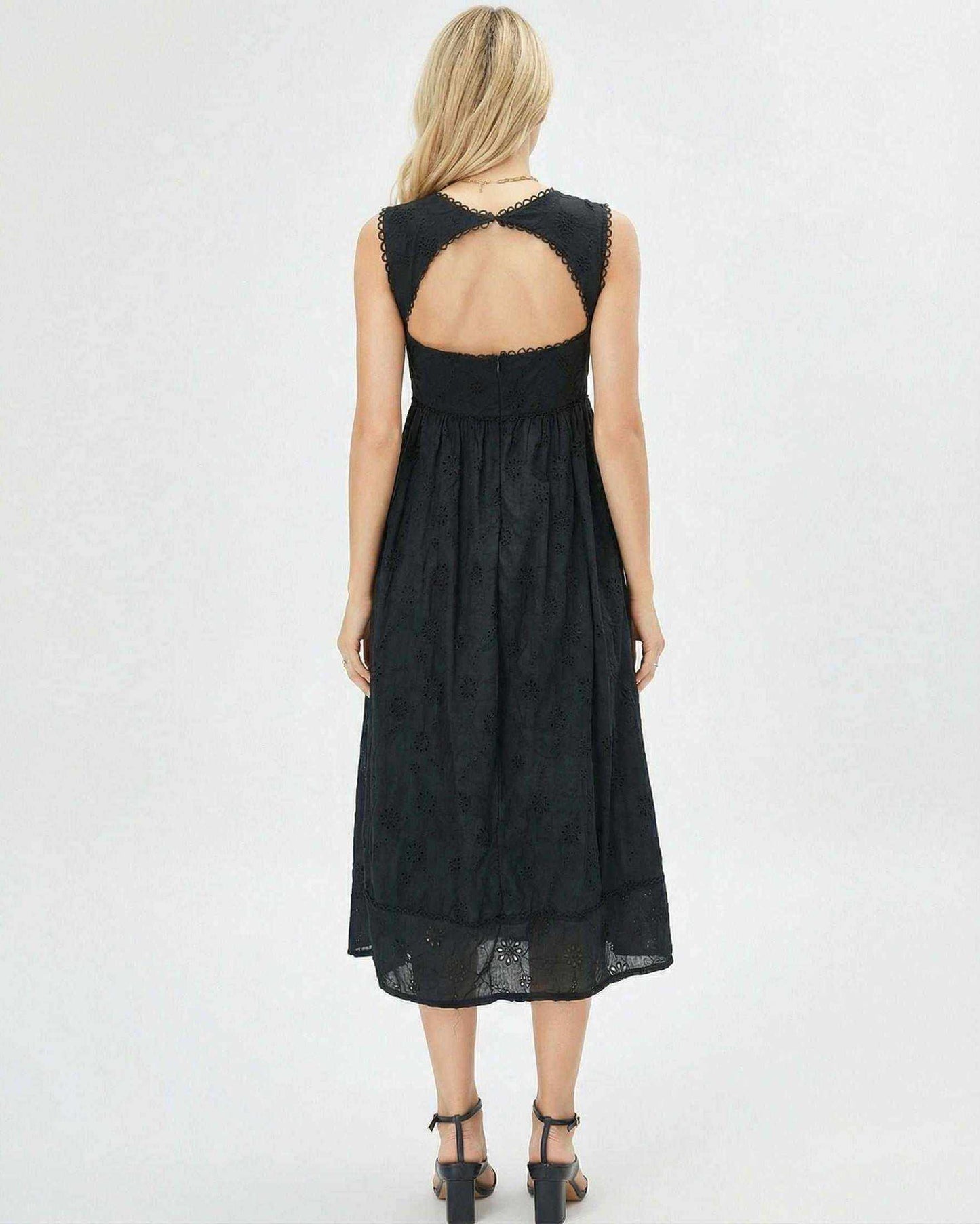 Back view of the Selene Midi Dress by Lauven, featuring a lace-trimmed square neck and flattering empire waist.