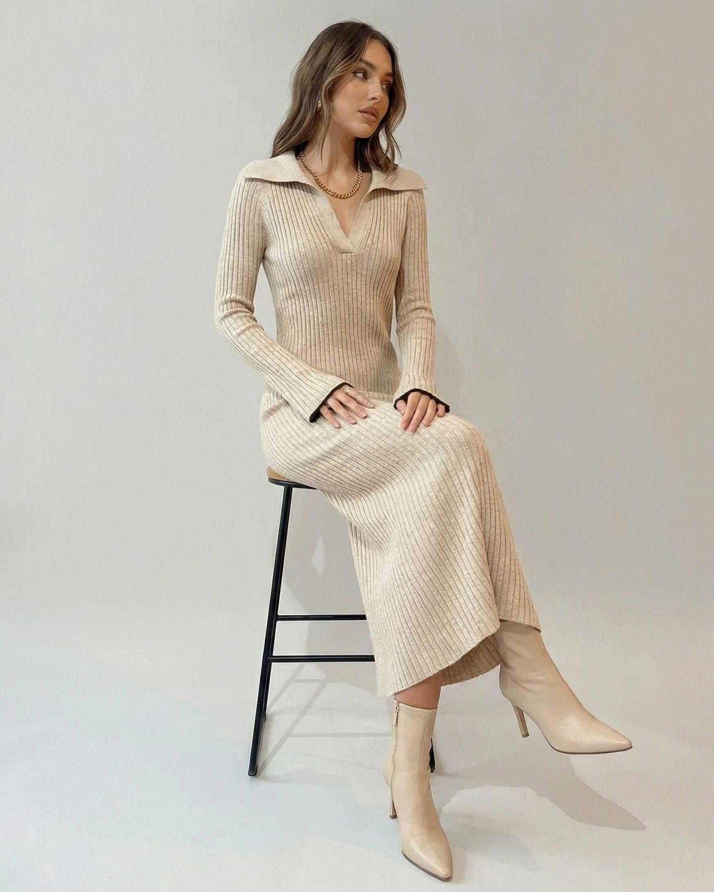 Selene Midi Dress by Lauven, a ribbed knit V-neck dress styled with ankle-length elegance.