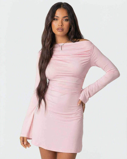 Selene Mini Dress by Lauven featuring an asymmetrical neckline and slim pencil silhouette in soft pink.