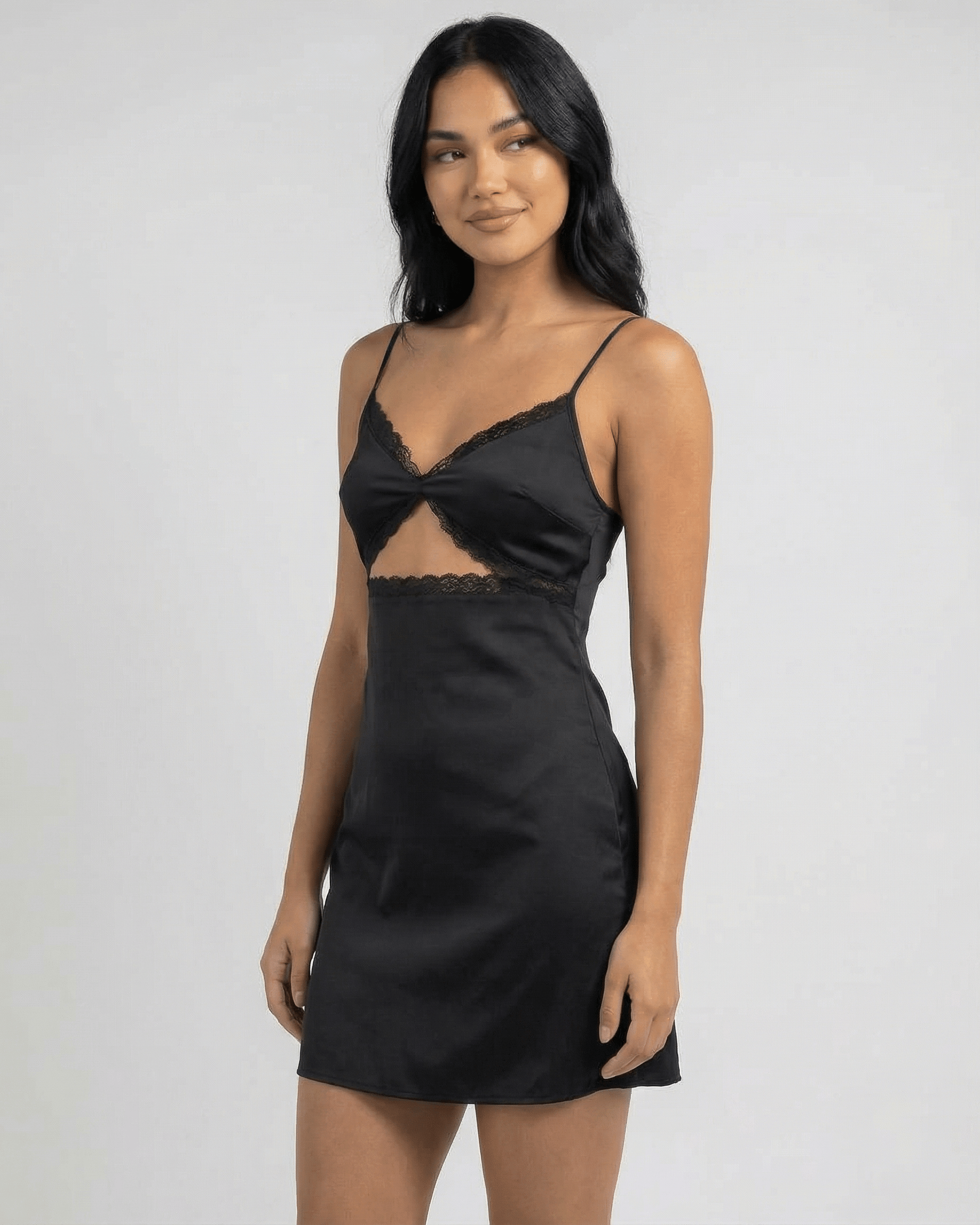 Selene Mini Dress by Lauven featuring a lace-trimmed V-neckline and spaghetti straps in black satin fabric.