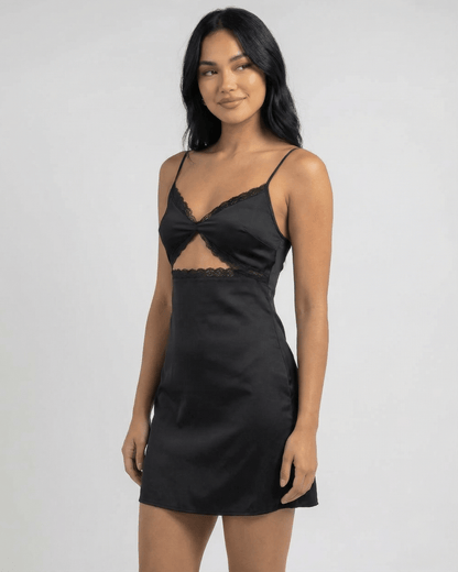 Selene Mini Dress by Lauven featuring a lace-trimmed V-neckline and spaghetti straps in black satin fabric.