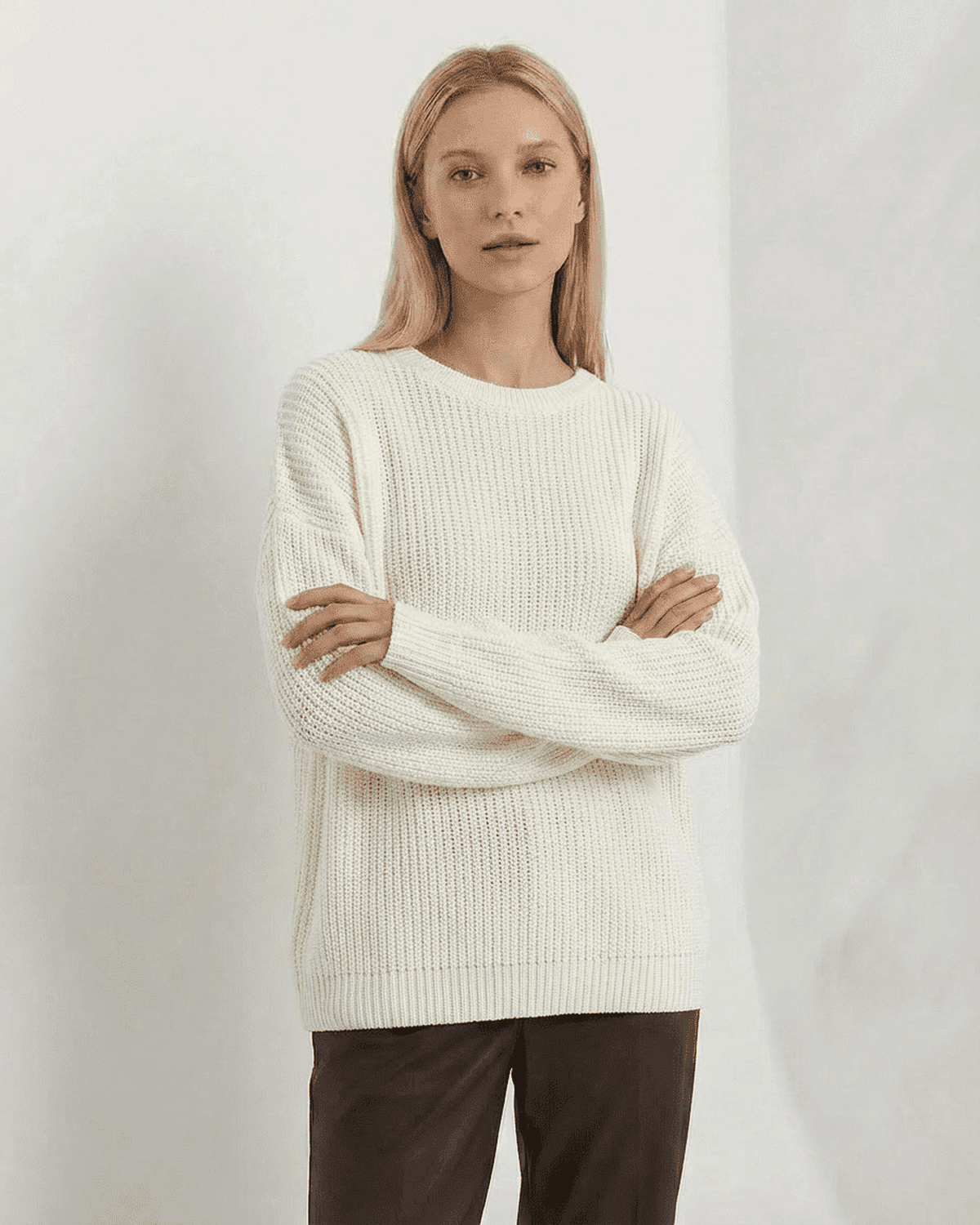 Seren Sweater from SLIMONA, a loose fit thick ribbed knit in ivory, perfect for cozy fall and winter days.