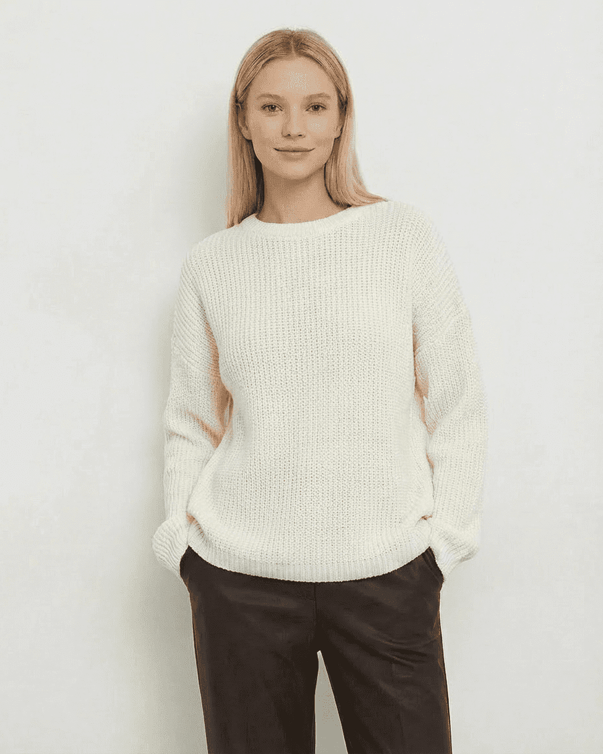 Seren Sweater in ivory by SLIMONA, featuring loose fit, thick ribbed knit, and round neck, perfect for cozy weather.