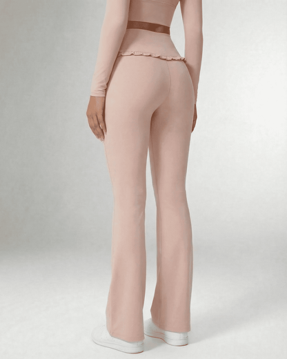 Back view of elegant Serena Leggings by SLIMONA, showcasing their stylish flare design and comfortable fit.