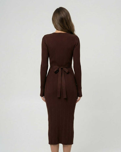 Sienna Midi Dress by Lauven, showcasing the back view of a ribbed long sleeve bodycon design.