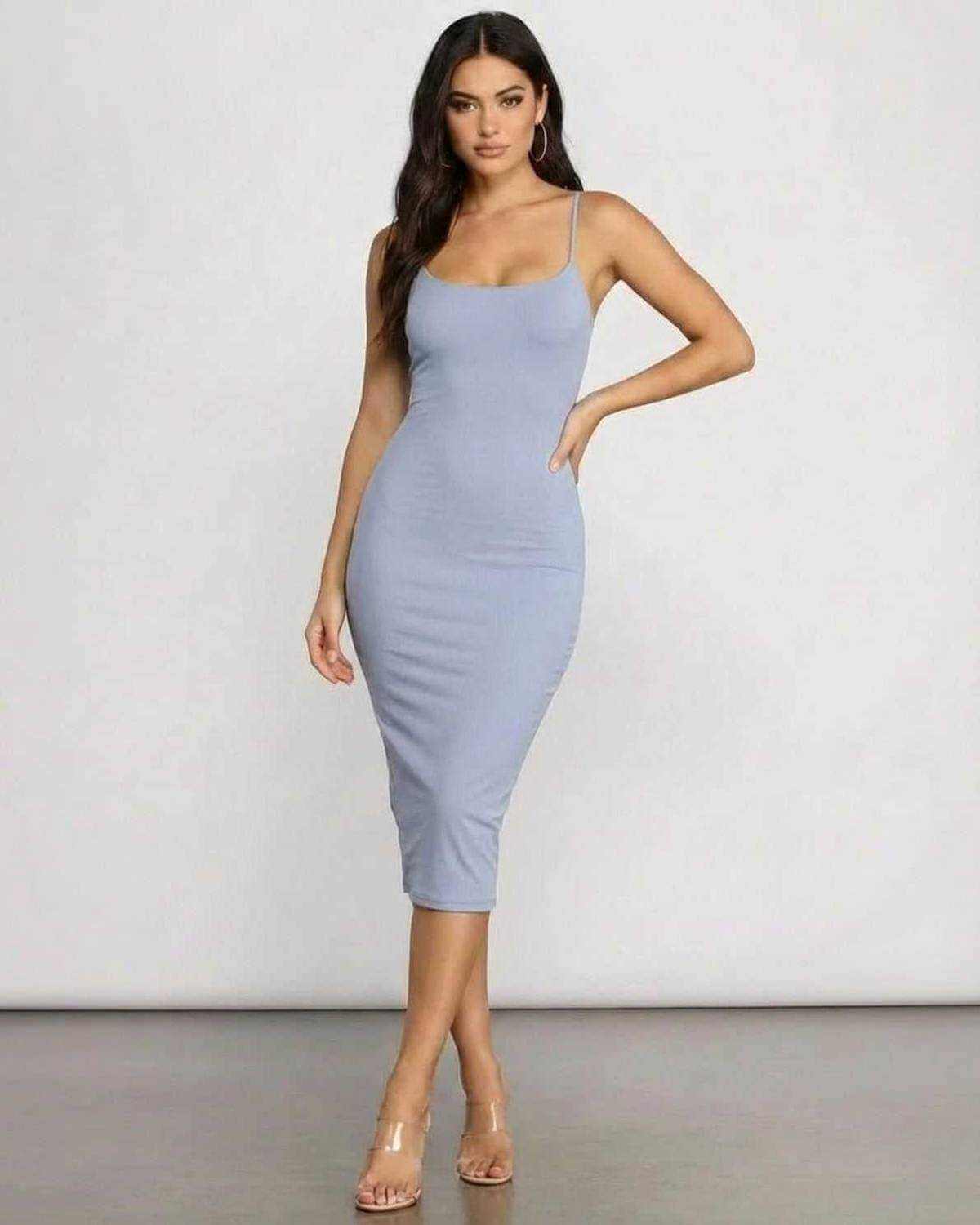 Sienna Midi Dress by SLIMONA, featuring a sleek knit and curve-enhancing silhouette in light blue.