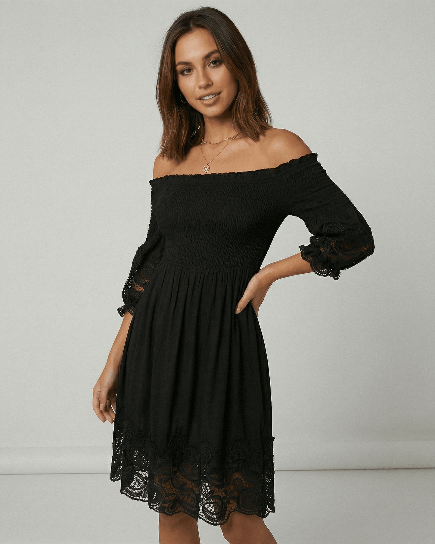 Sienna Midi Dress by Lauven – Women's black off shoulder A-Line midi dress with lace detailing.