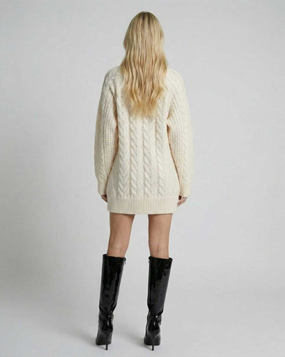 Back view of the Sienna Mini Dress by Lauven, showcasing cable knit texture and modern silhouette.