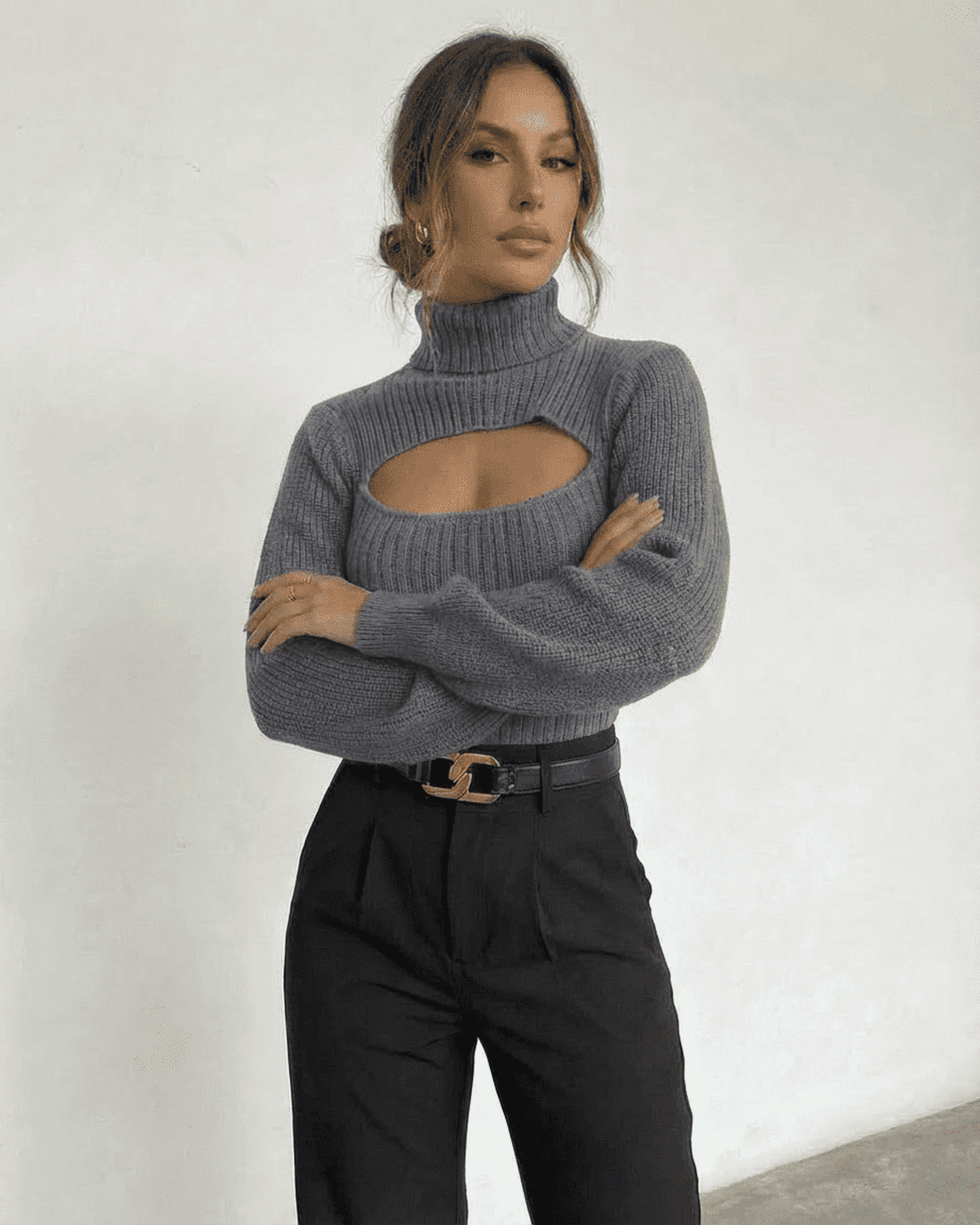 Slate Sweater by SLIMONA featuring a mock neck and cut out design, perfect for modern winter style.