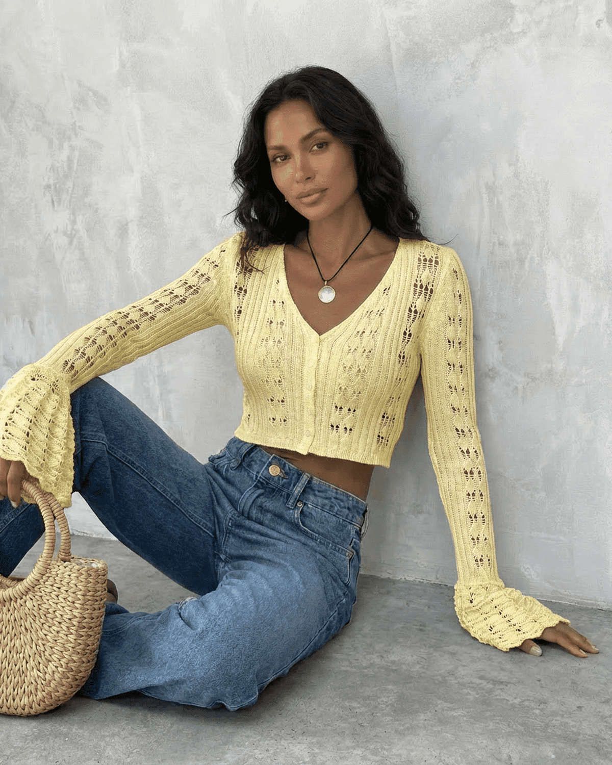 Solana Cardigan by SLIMONA in yellow, cropped cotton knit, featuring flare sleeves and a flattering V-neckline.