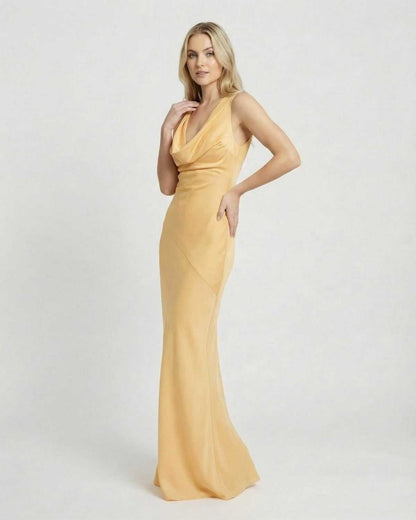 Solara Maxi Dress by SLIMONA, satin-effect cowl neck bodycon maxi dress in soft yellow, stylish floor-length silhouette.