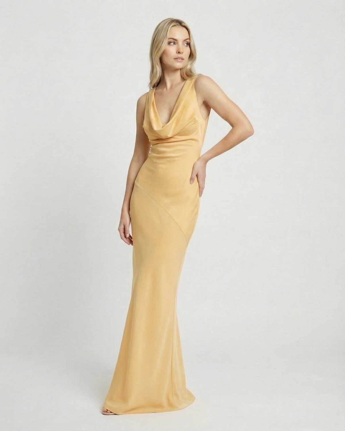 Solara Maxi Dress by SLIMONA, satin-effect cowl neck bodycon dress with a sleek silhouette in a soft yellow tone.