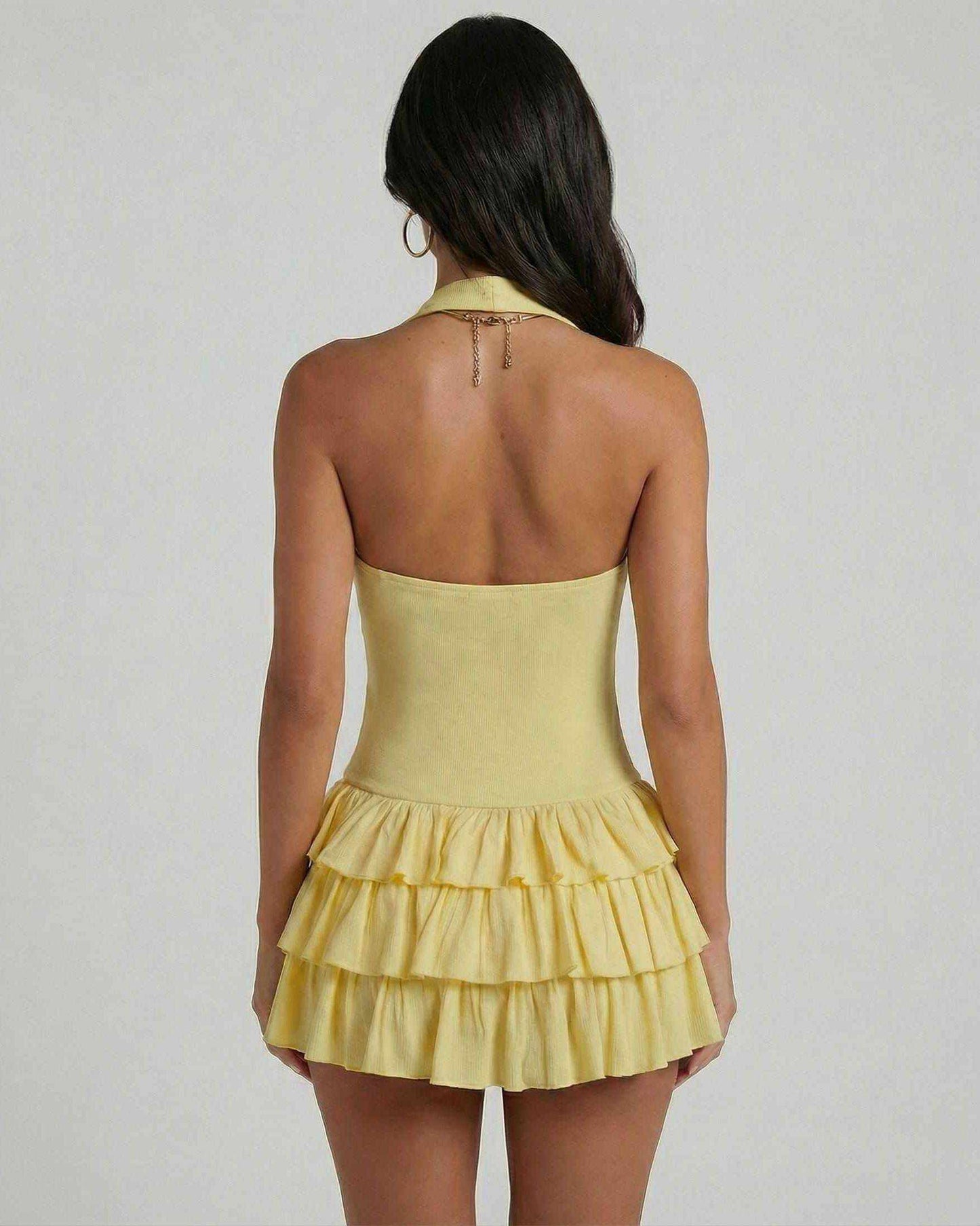 Back view of Solara Mini Dress by SLIMONA, featuring yellow tiered skirt and square neckline.