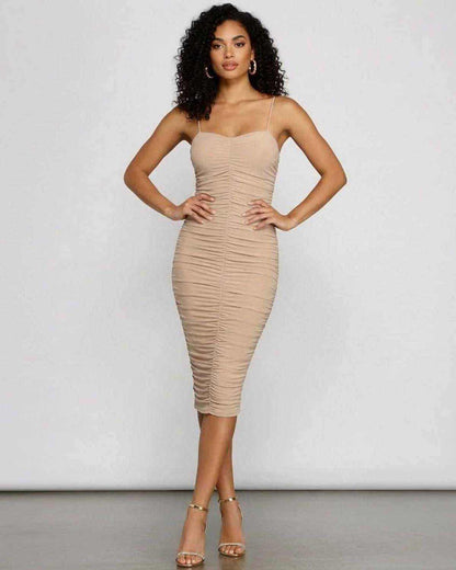 Solenne Midi Dress by SLIMONA featuring a sweetheart neckline and ruched bodycon fit in a neutral tone.